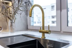 Bronze faucet for kitchen interior