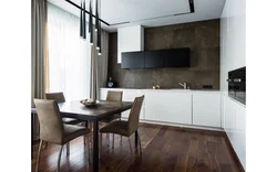 Dark walls, light kitchen in the interior