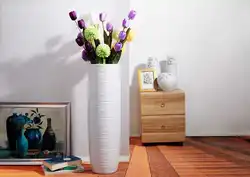 Artificial flowers for the interior in the hallway