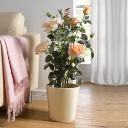 Artificial flowers for the interior in the hallway