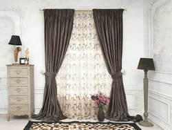 Velvet gray curtains in the living room interior