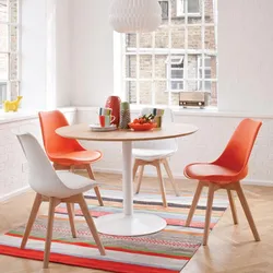 Orange chairs for the kitchen in the interior