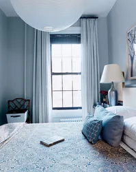 Gray-Blue Curtains In The Bedroom Interior