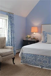 Gray-blue curtains in the bedroom interior