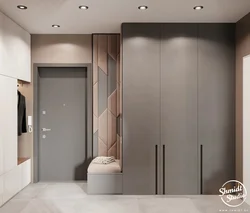 Hallway interior with mirror and pouf