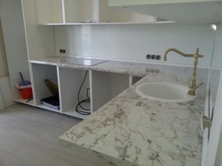 Milanese marble countertop in the kitchen interior