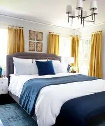 Gray blue bed in the bedroom interior