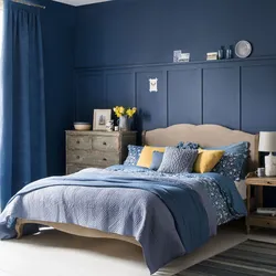Gray blue bed in the bedroom interior