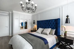 Gray blue bed in the bedroom interior