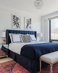 Gray blue bed in the bedroom interior