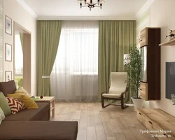Bej qonaq otağının interyerində yaşıl divan