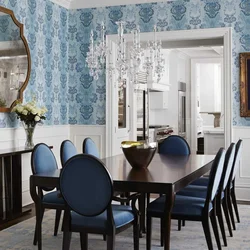 Blue chairs in the interior of a white kitchen