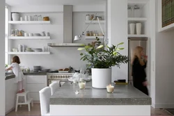 White shelves in the kitchen interior