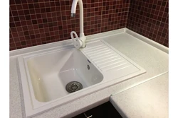 Semolina beige countertop in the kitchen interior