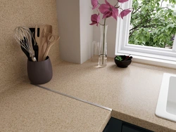 Semolina beige countertop in the kitchen interior