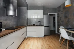 Gray kitchen with concrete look in the interior