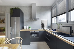 Gray kitchen with concrete look in the interior