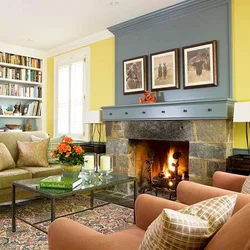 Living room interior with fireplace and paintings