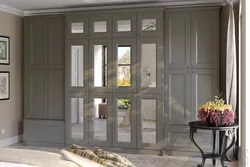 Classic wardrobe in the living room in the interior