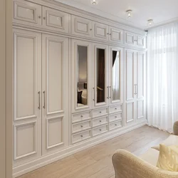 Classic wardrobe in the living room in the interior