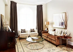 Curtains for a beige sofa in the living room interior