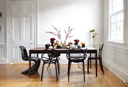 Kitchen Interior With Dark Table And Chairs