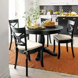 Kitchen interior with dark table and chairs