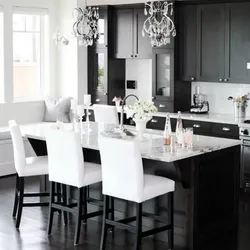 Kitchen interior with dark table and chairs