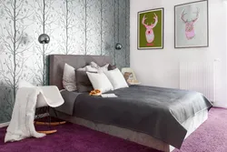 One wall of a different color in the bedroom interior