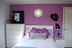 One wall of a different color in the bedroom interior