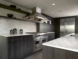 Gray Kitchen In The Interior With Marble Countertops