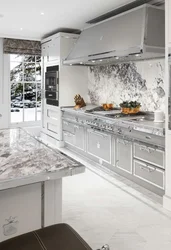 Gray Kitchen In The Interior With Marble Countertops