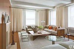Coffee with milk curtains in the living room interior