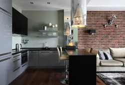 Kitchen and sofa on one wall in the interior