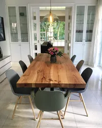 Wooden table and chairs for the kitchen in the interior