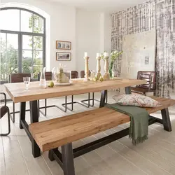 Wooden table and chairs for the kitchen in the interior