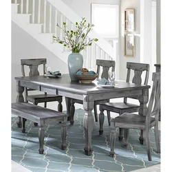 Wooden table and chairs for the kitchen in the interior