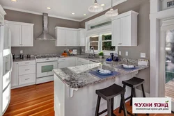 Living room kitchen design with peninsula