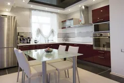 Kitchen design with burgundy chairs