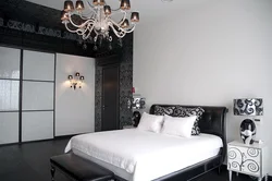 Bedroom design with black wardrobe
