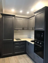 Small kitchen design refrigerator in the corner