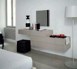 Bedroom design with chest of drawers and table