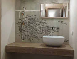 Bathroom design with pictures on the wall