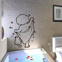 Bathroom design with pictures on the wall