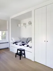 Bedroom design with a niche for a closet