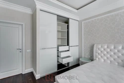 Bedroom design with a niche for a closet