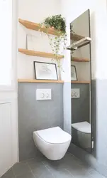 Installation design in the bathroom with shelves