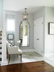 Mirror opposite mirror in hallway design