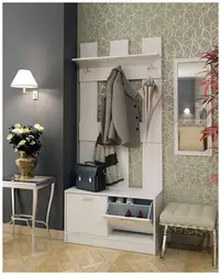 Hallway design with shoe rack and ottoman
