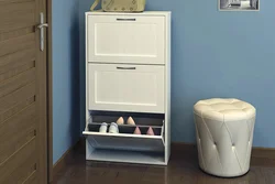 Hallway design with shoe rack and ottoman